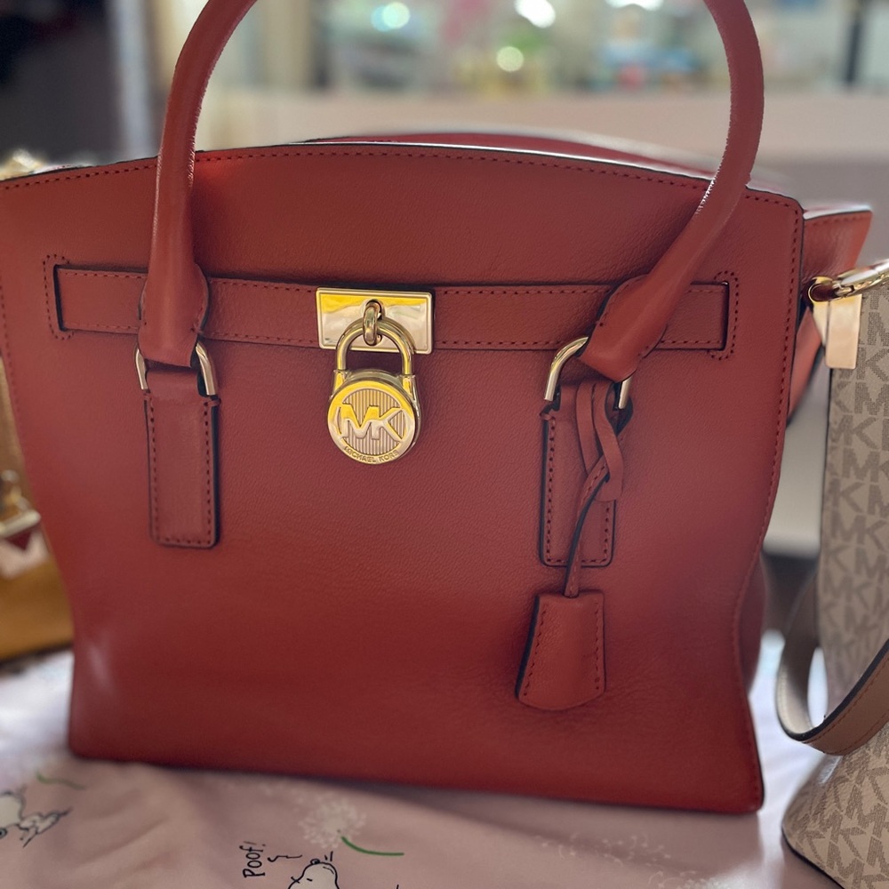 Michael Kors bags in several colors and designs